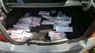 Cigarros estavam no porta mala do carro 