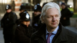 Wikileaks founder Julian Assange arrives at the Supreme Court in Westminste